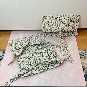 Agua by Agua Bendita Cream and Blue Floral Clutch. Selling individually.